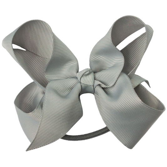 Hårstrikk med sløyfe - Den lille prikken over i'en