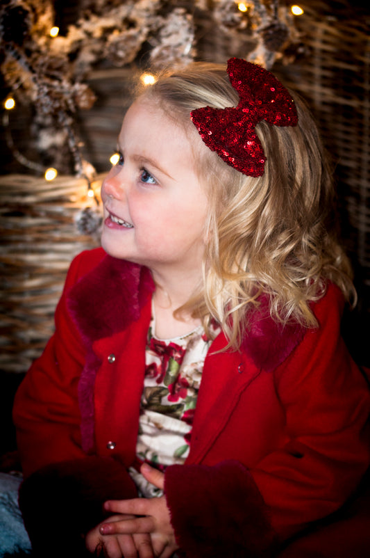 Paljettsløyfe - Den lille prikken over i'en